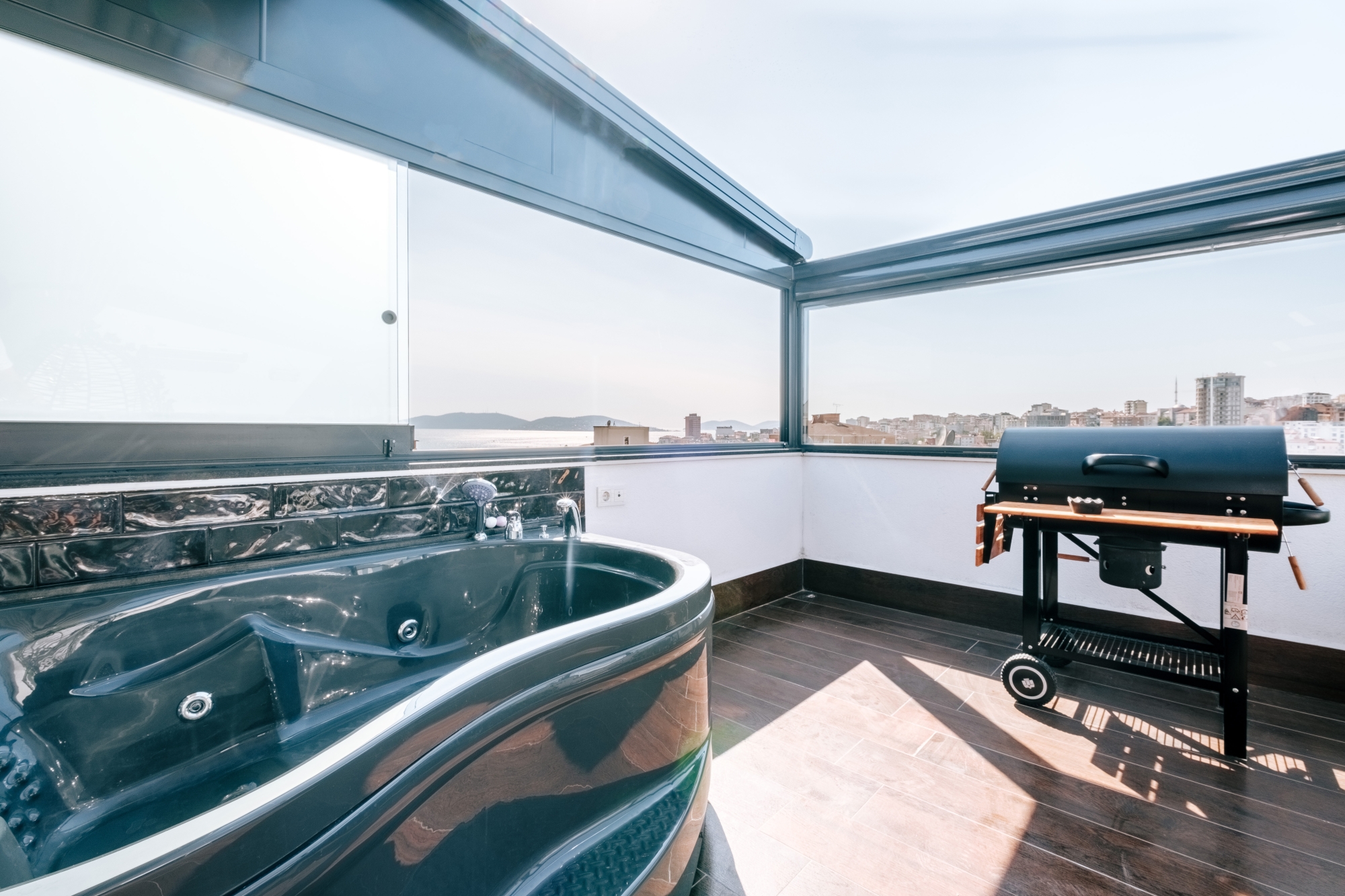 Relax and unwind in the ultimate comfort of our terrace jacuzzi.