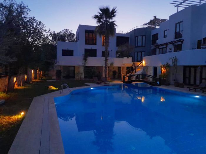 Villa with Garden & Shared Pool – 4 Min from Beach
